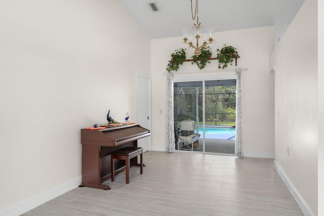 5647 SE Sailfish Way, Stuart, FL 34997 - dining space featuring a chandelier and baseboards