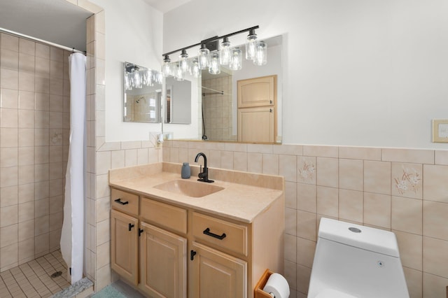 5647 SE Sailfish Way, Stuart, FL 34997 - full bathroom featuring tile walls, vanity, and a shower stall