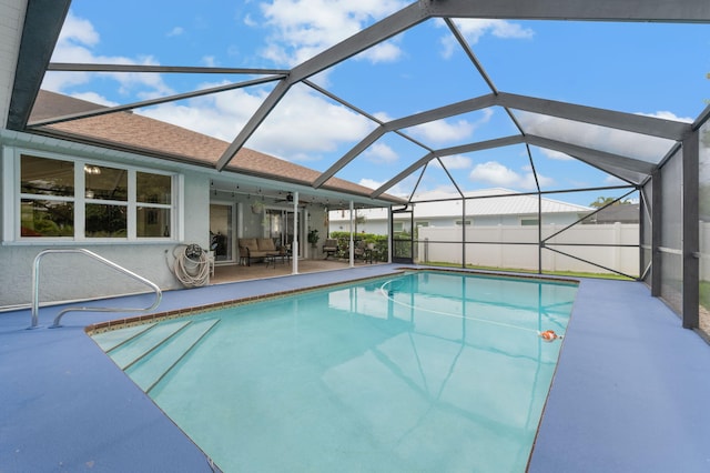 5647 SE Sailfish Way, Stuart, FL 34997 - view of pool with a patio, a ceiling fan, and glass enclosure