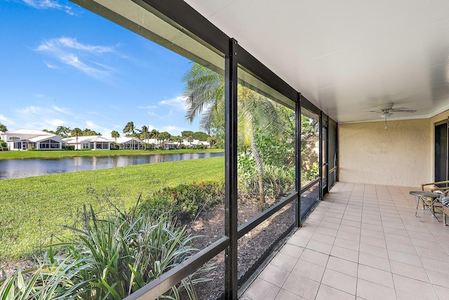 3733 Cape Pointe Cir, Jupiter, FL 33477 - unfurnished sunroom featuring a water view, a ceiling fan, and a residential view