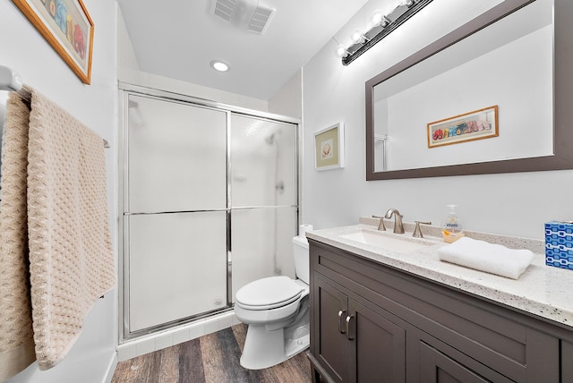 3733 Cape Pointe Cir, Jupiter, FL 33477 - bathroom with vanity, wood finished floors, and a stall shower