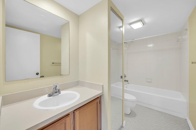 5693 SE Windsong Ln Unit 545, Stuart, FL 34997 - bathroom featuring vanity, shower / bath combination, and tile patterned flooring