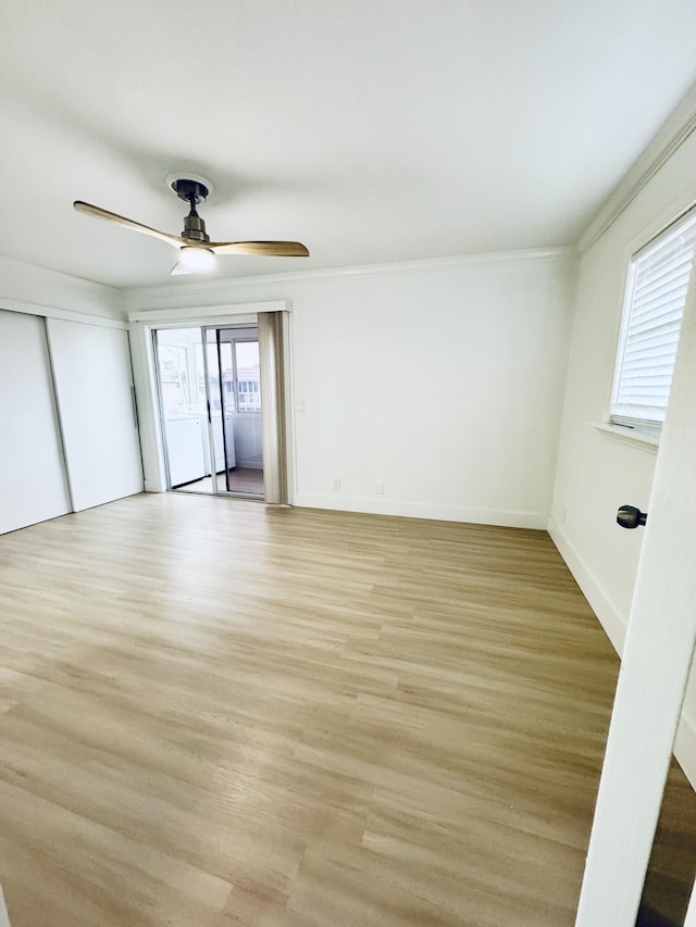 330 Saxony G 330, Delray Beach, FL 33446 - spare room with light wood-type flooring, a ceiling fan, and ornamental molding