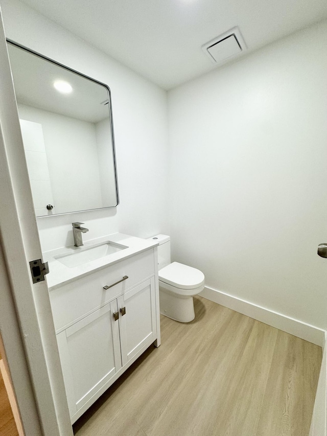 330 Saxony G 330, Delray Beach, FL 33446 - half bath featuring wood finished floors and vanity