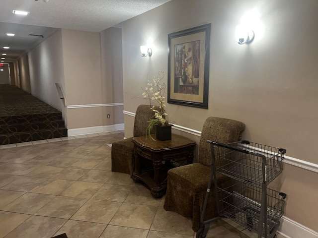 500 Executive Center Dr Unit 3F, West Palm Beach, FL 33401 - lobby featuring a textured ceiling