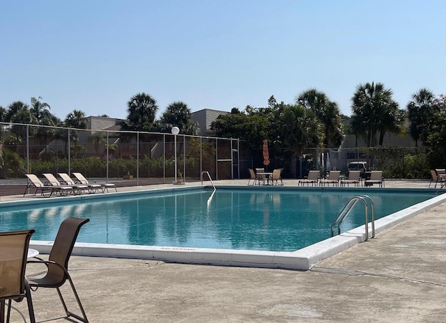 500 Executive Center Dr Unit 3F, West Palm Beach, FL 33401 - community pool with a patio area