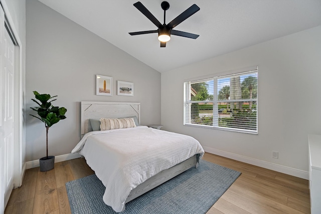 6572 Brookhurst Cir, Lake Worth, FL 33463 - bedroom featuring light wood-style floors, lofted ceiling, and ceiling fan