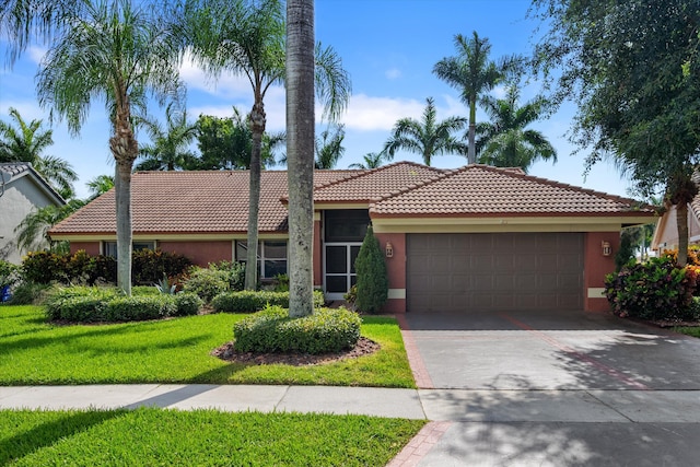 6572 Brookhurst Cir, Lake Worth, FL 33463 - ranch-style house featuring a tiled roof, an attached garage, stucco siding, driveway, and a front lawn