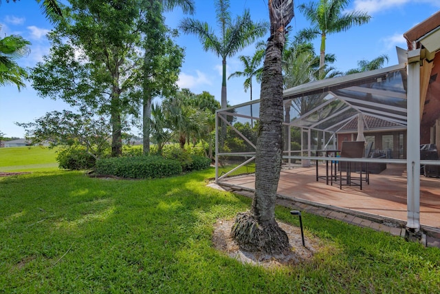 6572 Brookhurst Cir, Lake Worth, FL 33463 - view of green lawn with a lanai and a patio