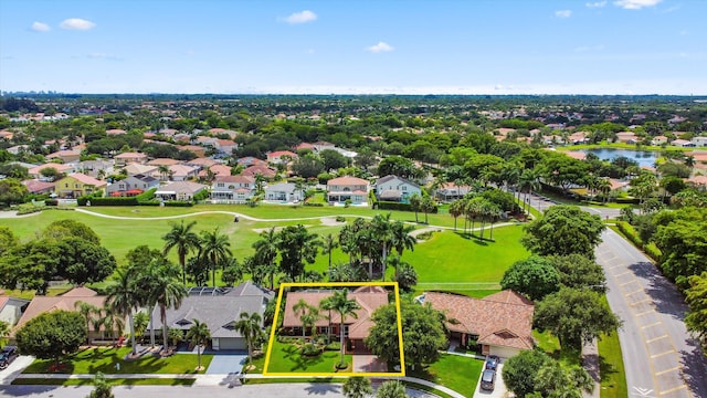 6572 Brookhurst Cir, Lake Worth, FL 33463 - aerial perspective of suburban area with property parcel outlined, a large body of water, and a golf course