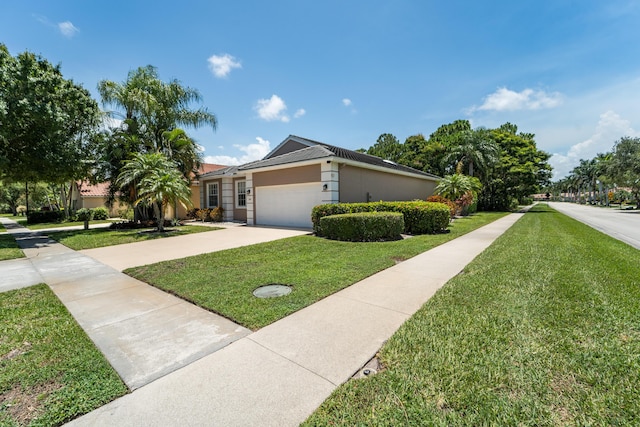 3002 SE Brierwood Pl, Stuart, FL 34997 - ranch-style home featuring a front yard, a garage, concrete driveway, and stucco siding