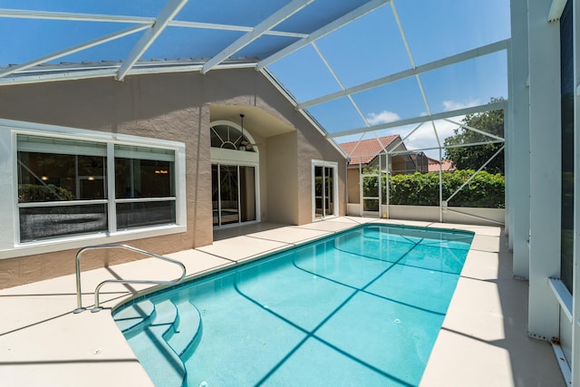3002 SE Brierwood Pl, Stuart, FL 34997 - outdoor pool with a patio and glass enclosure