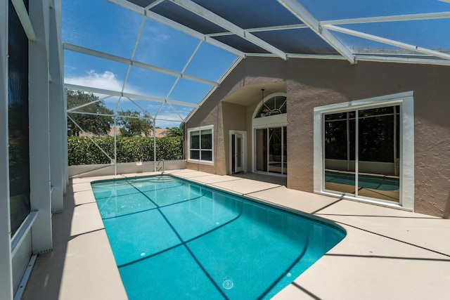 3002 SE Brierwood Pl, Stuart, FL 34997 - outdoor pool with a patio area and glass enclosure
