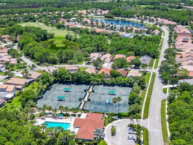 3002 SE Brierwood Pl, Stuart, FL 34997 - aerial perspective of suburban area featuring a nearby body of water and a golf club