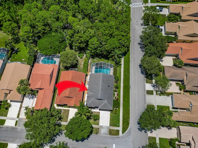 3002 SE Brierwood Pl, Stuart, FL 34997 - aerial perspective of suburban area featuring a pool