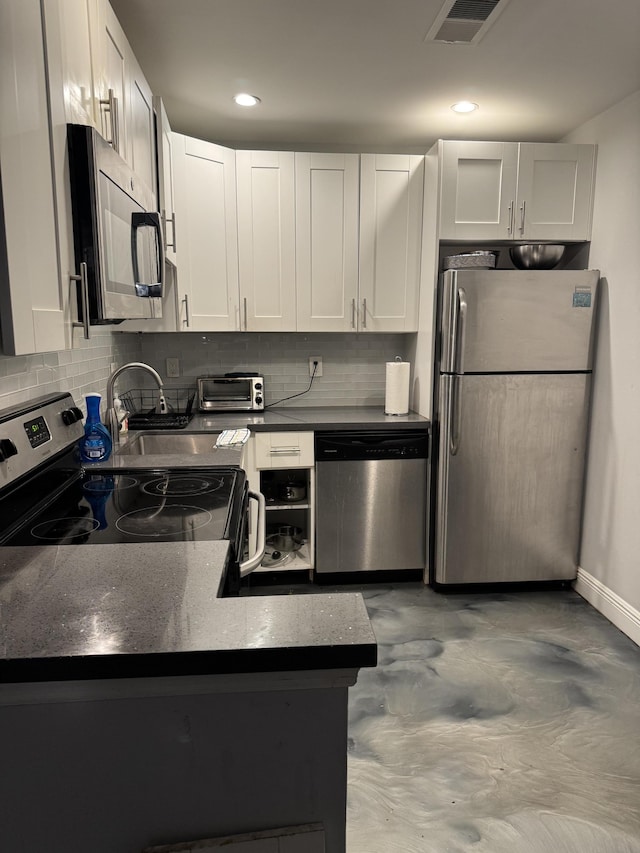 470 NW 20th St Unit 3070, Boca Raton, FL 33431 - kitchen featuring stainless steel appliances, tasteful backsplash, white cabinets, and recessed lighting