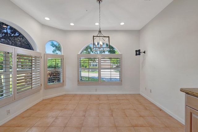 163 Pepper Ln, Jensen Beach, FL 34957 - unfurnished dining area featuring a chandelier, recessed lighting, and light tile patterned floors