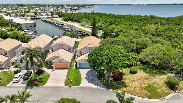 163 Pepper Ln, Jensen Beach, FL 34957 - aerial perspective of suburban area with a large body of water