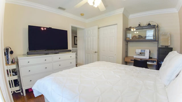 126 Hidden Hollow Dr, Palm Beach Gardens, FL 33418 - bedroom featuring ornamental molding, dark wood-style flooring, and a ceiling fan