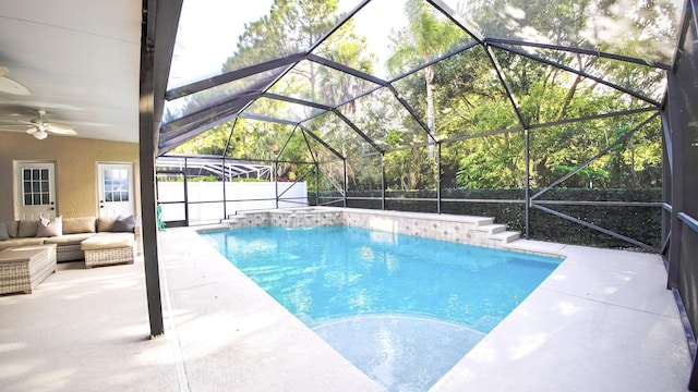 126 Hidden Hollow Dr, Palm Beach Gardens, FL 33418 - swimming pool with a patio, an outdoor living space, ceiling fan, and a lanai