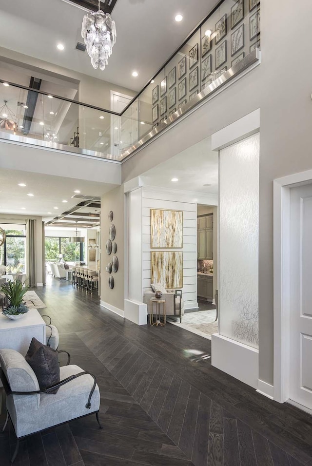 13405 Artisan Cir, Palm Beach Gardens, FL 33418 - building lobby featuring a high ceiling and recessed lighting