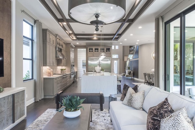 13405 Artisan Cir, Palm Beach Gardens, FL 33418 - living area featuring dark wood-style floors, coffered ceiling, recessed lighting, and beam ceiling