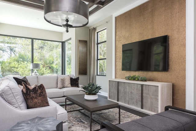 13405 Artisan Cir, Palm Beach Gardens, FL 33418 - living area with coffered ceiling, wood finished floors, and beamed ceiling