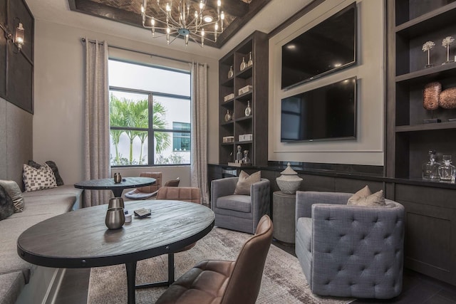 13405 Artisan Cir, Palm Beach Gardens, FL 33418 - living area with built in features and a chandelier
