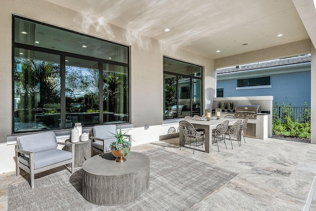 13405 Artisan Cir, Palm Beach Gardens, FL 33418 - view of patio / terrace with an outdoor kitchen and outdoor dining area