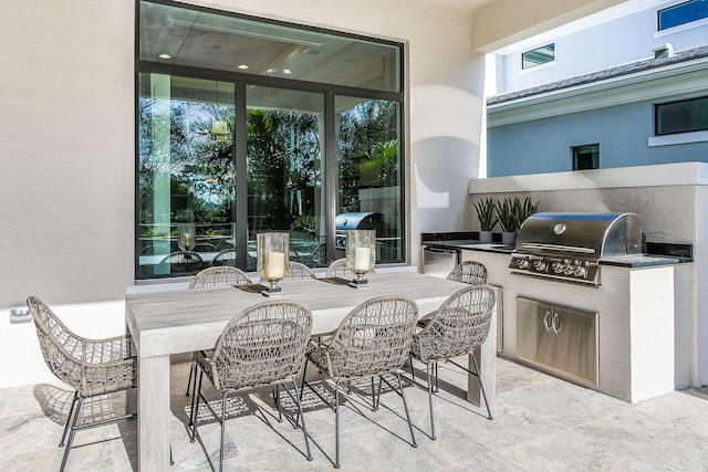 13405 Artisan Cir, Palm Beach Gardens, FL 33418 - view of patio / terrace with area for grilling and outdoor dining space