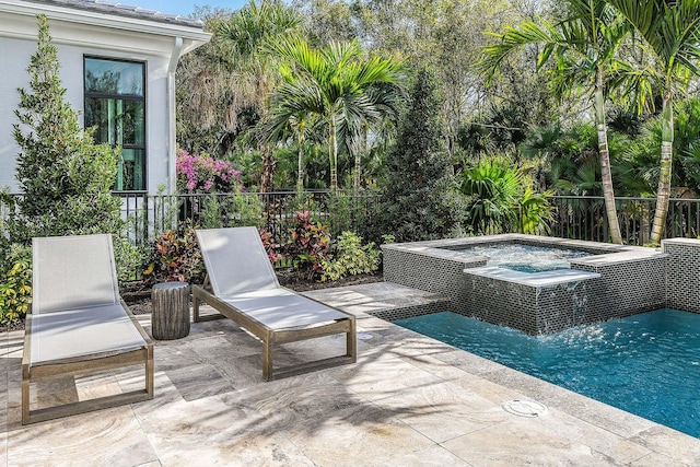 13405 Artisan Cir, Palm Beach Gardens, FL 33418 - view of pool featuring a patio area and a pool with connected hot tub
