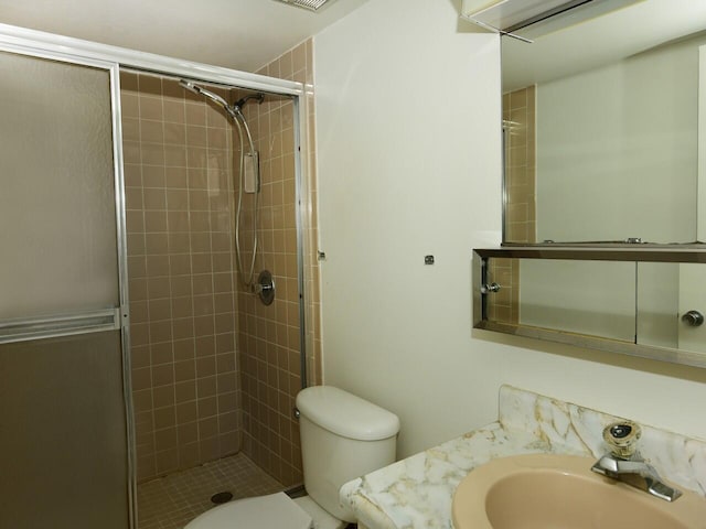 2 Golfs Edge Unit F, West Palm Beach, FL 33417 - bathroom featuring a shower stall and vanity