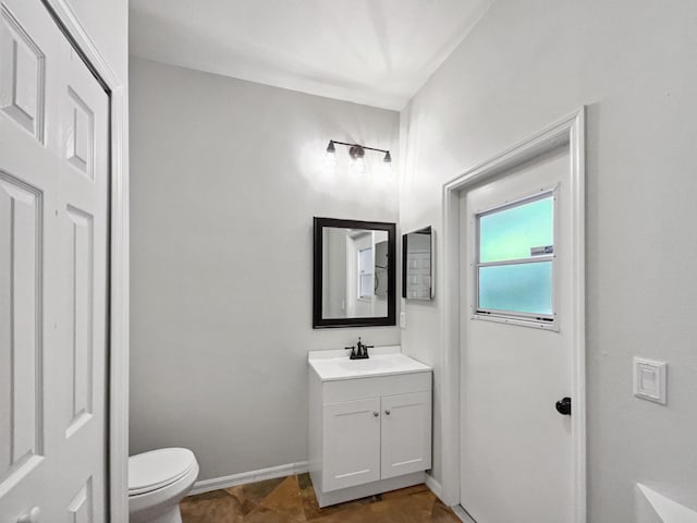 2081 SW Burlington St, Port Saint Lucie, FL 34984 - bathroom featuring vanity and toilet