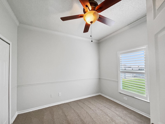 2081 SW Burlington St, Port Saint Lucie, FL 34984 - unfurnished room featuring crown molding, carpet floors, ceiling fan, and a textured ceiling