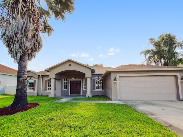 2081 SW Burlington St, Port Saint Lucie, FL 34984 - ranch-style house featuring stucco siding, an attached garage, driveway, and a front yard