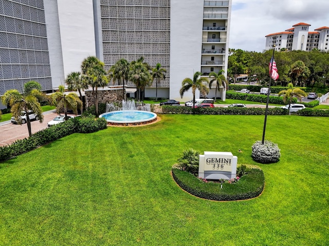 336 Golfview Rd Unit 1006, North Palm Beach, FL 33408 - view of home's community with a yard