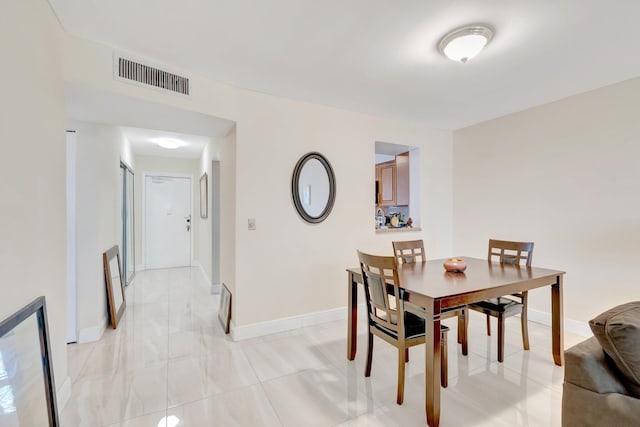 14723 Cumberland Dr Unit 404B, Delray Beach, FL 33446 - dining room with baseboards
