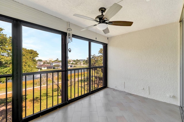 14723 Cumberland Dr Unit 404B, Delray Beach, FL 33446 - unfurnished sunroom featuring a ceiling fan