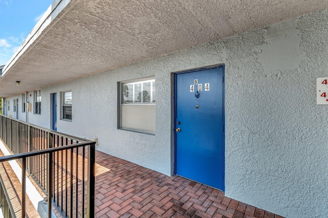14723 Cumberland Dr Unit 404B, Delray Beach, FL 33446 - entrance to property featuring stucco siding