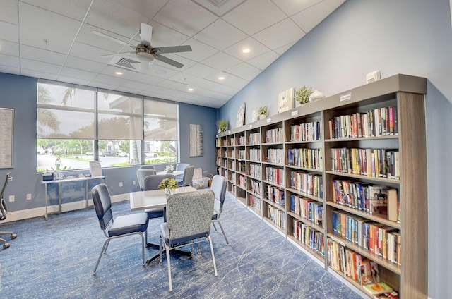 14723 Cumberland Dr Unit 404B, Delray Beach, FL 33446 - office area featuring carpet flooring, a ceiling fan, and bookshelves