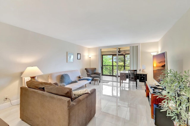 14723 Cumberland Dr Unit 404B, Delray Beach, FL 33446 - living area featuring ceiling fan and light tile patterned floors