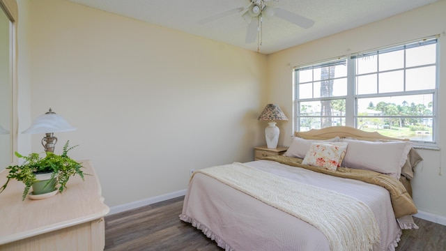 1563 SE Royal Green Cir Unit B-204, Port Saint Lucie, FL 34952 - bedroom with wood finished floors and ceiling fan