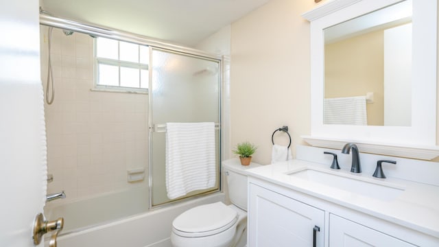 1563 SE Royal Green Cir Unit B-204, Port Saint Lucie, FL 34952 - bathroom featuring vanity and combined bath / shower with glass door