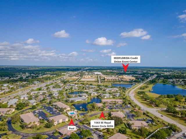 1563 SE Royal Green Cir Unit B-204, Port Saint Lucie, FL 34952 - aerial view of property's location featuring a large body of water and nearby suburban area