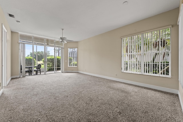407 SW Fairway Lndg, Port Saint Lucie, FL 34986 - carpeted empty room with ceiling fan and baseboards