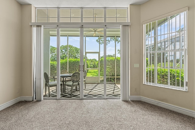 407 SW Fairway Lndg, Port Saint Lucie, FL 34986 - doorway to outside featuring carpet floors and ceiling fan
