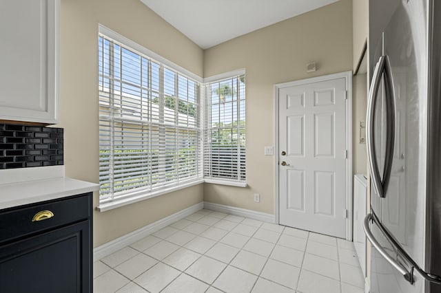 407 SW Fairway Lndg, Port Saint Lucie, FL 34986 - foyer entrance with plenty of natural light and light tile patterned flooring
