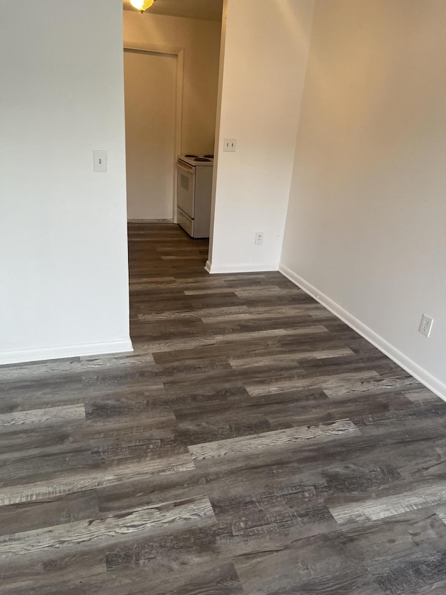 4316 Forest Rd, West Palm Beach, FL 33406 - spare room with dark wood-style flooring and baseboards
