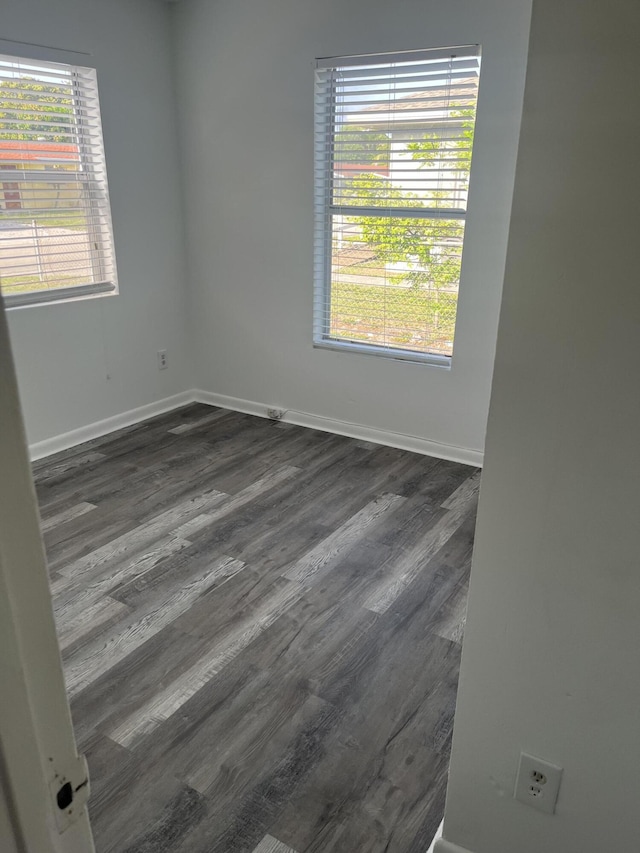 4316 Forest Rd, West Palm Beach, FL 33406 - empty room with dark wood-type flooring