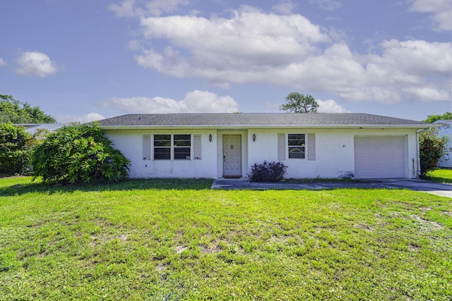 ranch-style house featuring a garage, stucco siding, driveway, and a front lawn